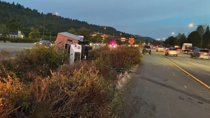 Rolled over semi blocks lanes on I-90 at SR 900 near Issaquah