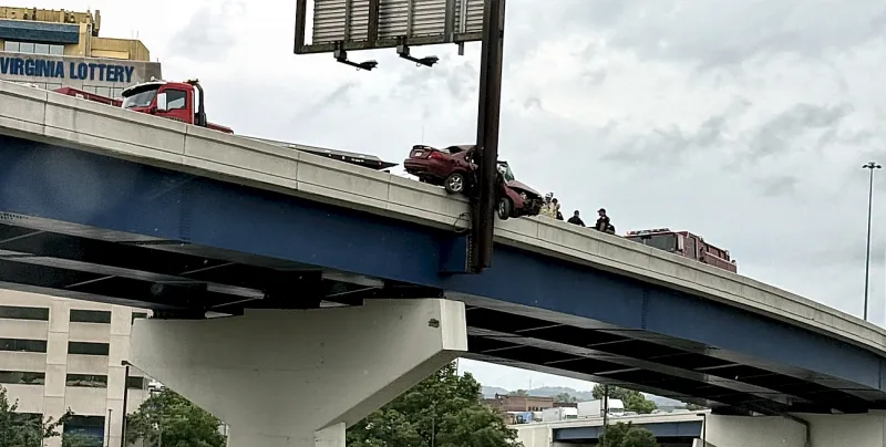 Car nearly topples off interstate in Charleston