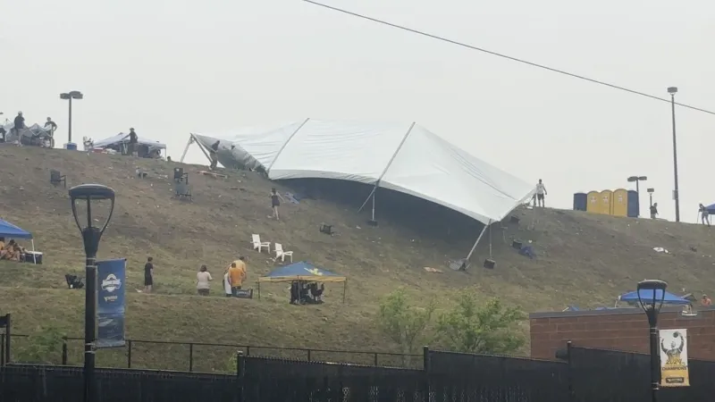 Multiple people hospitalized after storm sends tent flying during WVU baseball game
