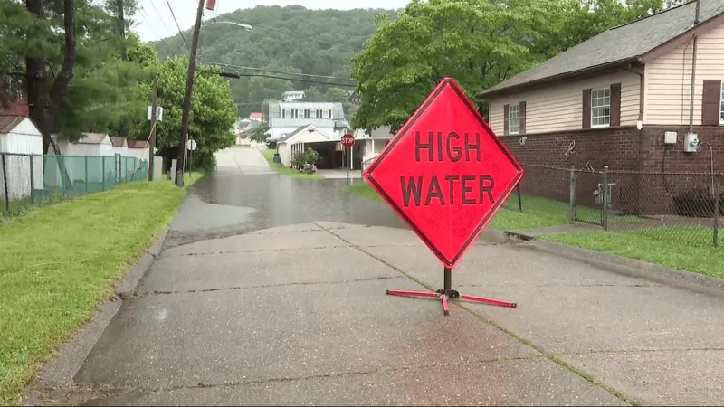 Emergency officials urge caution as heavy rain results in flooding across West Virginia