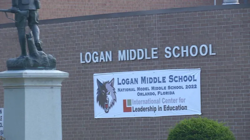 Logan Middle School principal remains on leave amid accusation he didn't report abuse