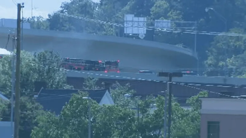 One dead after tractor trailer crashes, catches fire along I-64 in Kanawha County