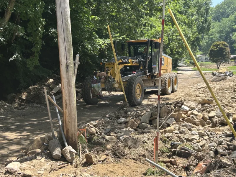 Crews rebuild flood damaged road in Boone County