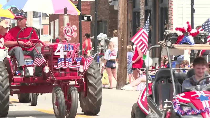 Hurricane marks America's 250th with governor visit, parade floats and fire engine pull
