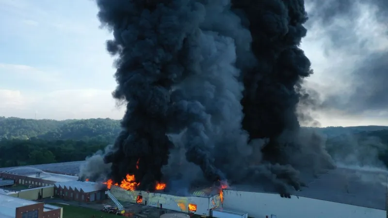 Several crews on scene of massive warehouse fire in Parkersburg