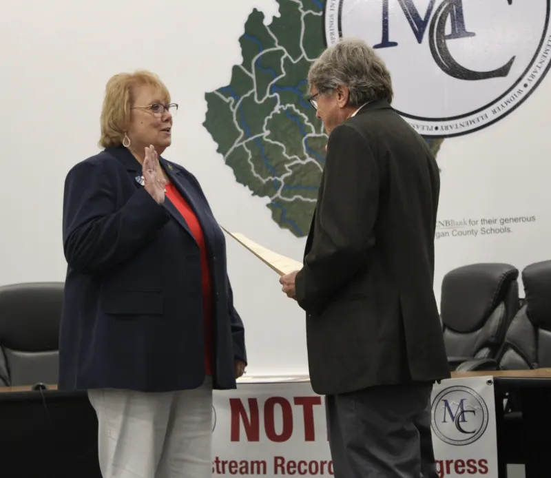 Hessler sworn as new school board member, others take oath of office