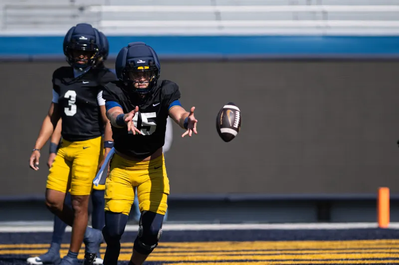 Rich Rodriguez doesn't name WVU football's starting QB, provides updates on battle