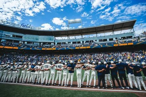 'CBS Sunday Morning' Latest to Document The Hold of 'Country Roads' on Sports Fans