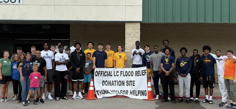 'We're fortunate to do it and have this influence': Mountaineer men's basketball team offers assistance in Weston