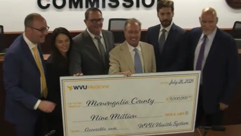 WVU Medicine presents $9 million to Monongalia County Commission for county public health initiatives
