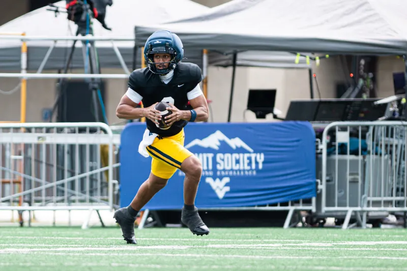 WVU quarterbacks working on ball security, decision-making early this fall