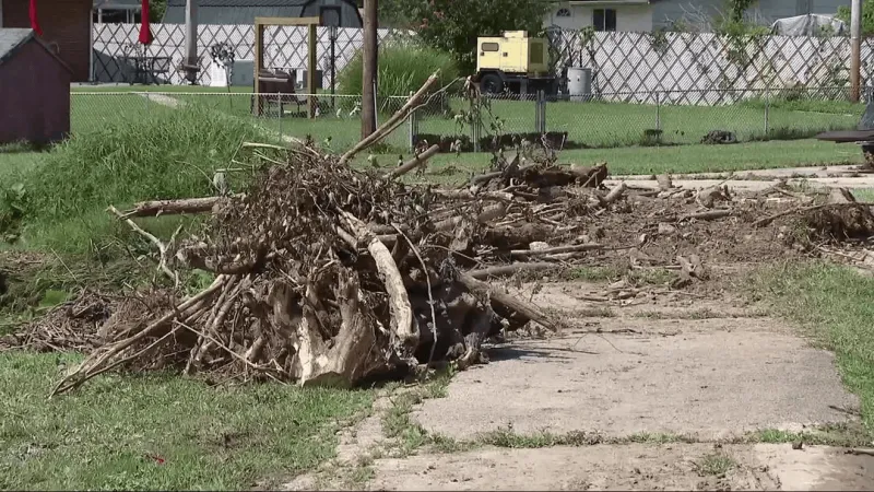 Neighbors urge creek dredging and cleanup after Campbells Creek flooding