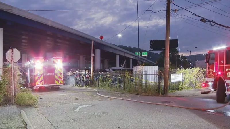 Tractor-trailer rolls off highway in Charleston