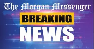 Suspended magistrate charged with brandishing weapon