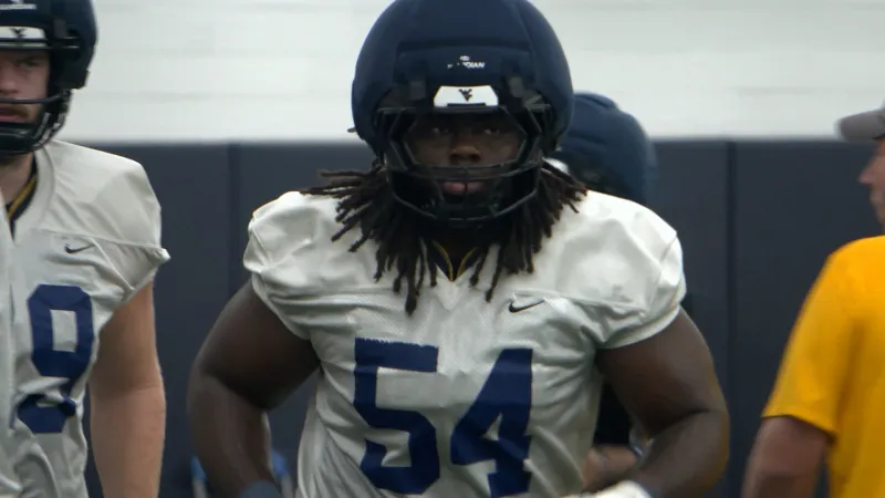 Trickett's leadership led Amare Grayson from Jacksonville State to Morgantown