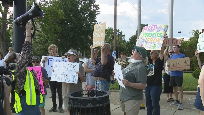 Those against Flock cameras going door-to-door in Huntington