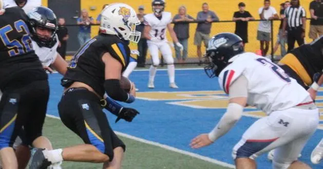 Prep football: Logan opens season with dominant win over rival Man
