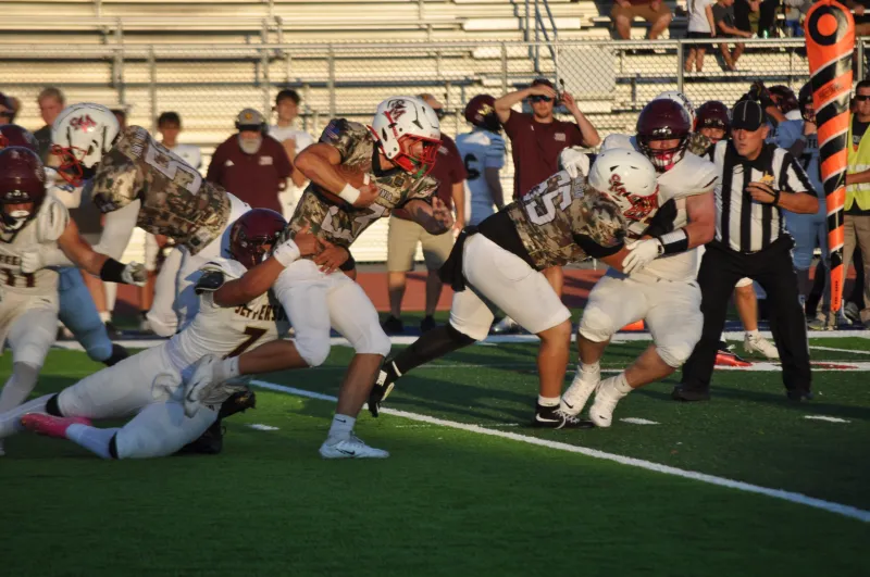 Cardinals open it up in second half, pull away from Jefferson for 49-19 victory