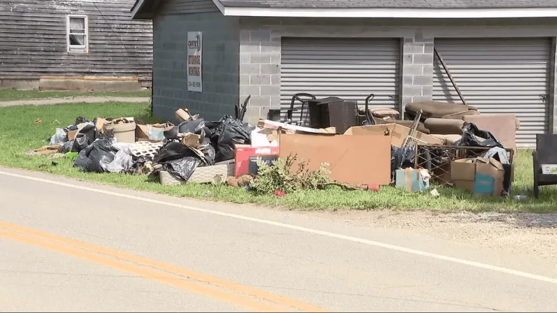 Kanawha County families continue flood cleanup; residents urged to report property damage