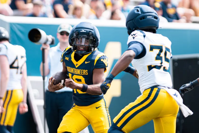 LB coach Andrew Warwick's decision to join WVU was no-brainer, trying to instill history of program in players
