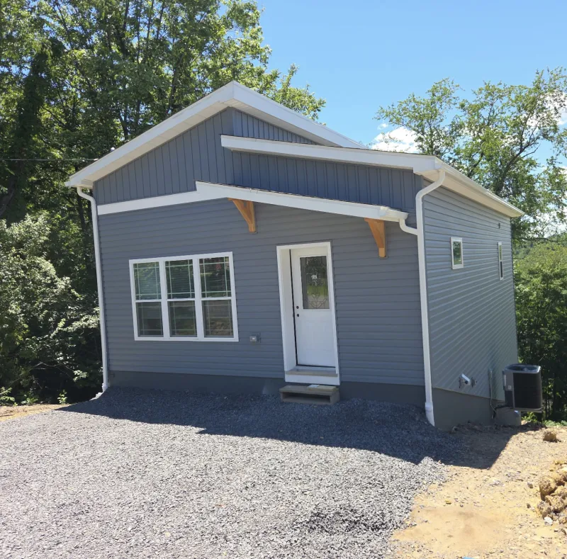 Mon Habitat dedicates two more homes in University City