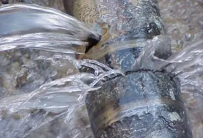 Bridgeport Public Works Crews on Site of City Water Leak in Residential Area; No Water Possible for Hours