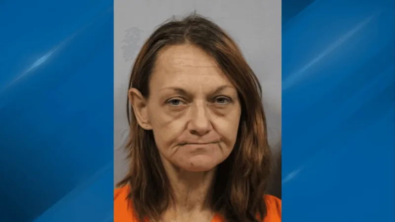 Woman accused of breaking into Rand Community Center, found hiding in clothing rack