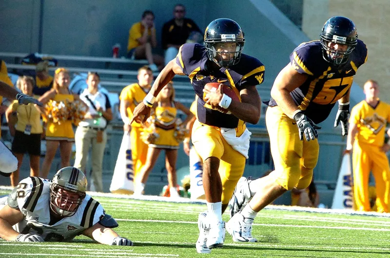 Pat White looks back on journey to play quarterback, wear No. 5 before jersey is retired at WVU before Coastal Carolina