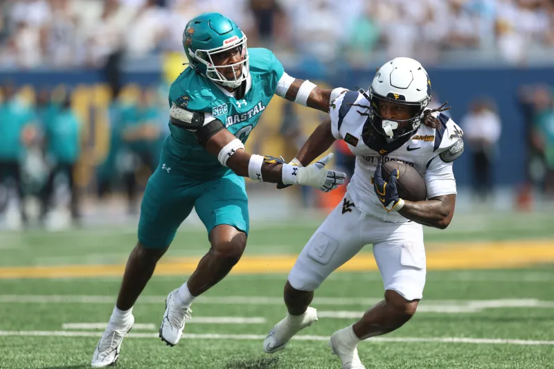WVU football runs off late Coastal Carolina surge to win first game of season