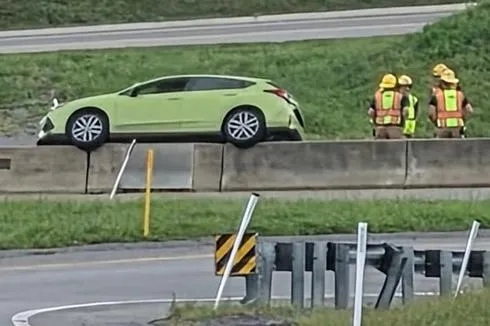 No Injuries in Route 50 East Harrison County Accident Resulting in Rare Vehicle Stuck on Concrete Barrier