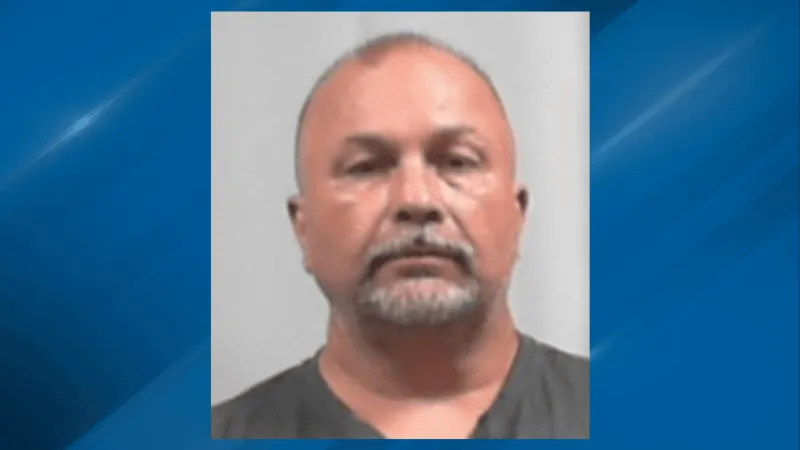 Man arrested after troopers find him in the middle of alleged burglary in Putnam County