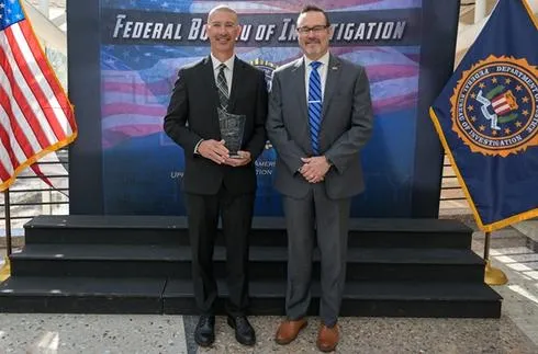 Retired Clarksburg Police Detective Michael Walsh is Honored with FBI's Community Leadership Award