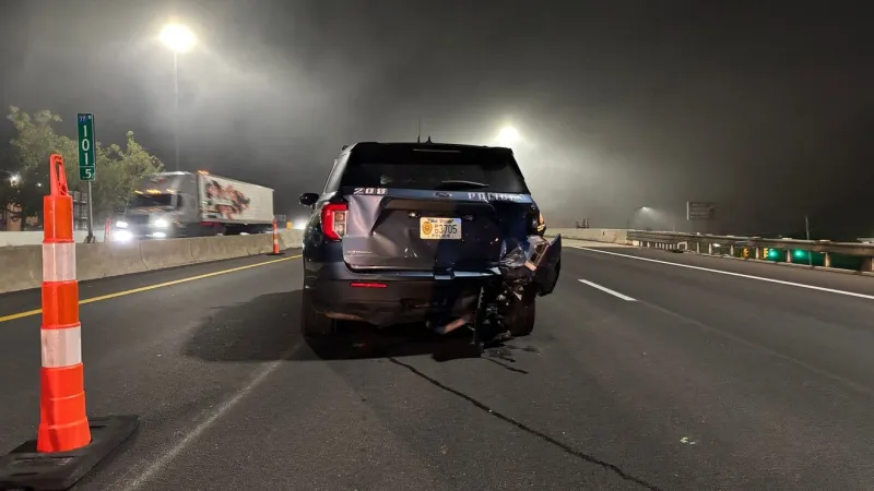 I-77 NB down to one lane after car hits police cruiser