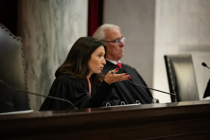 Justices hear arguments in case challenging education rule-making law