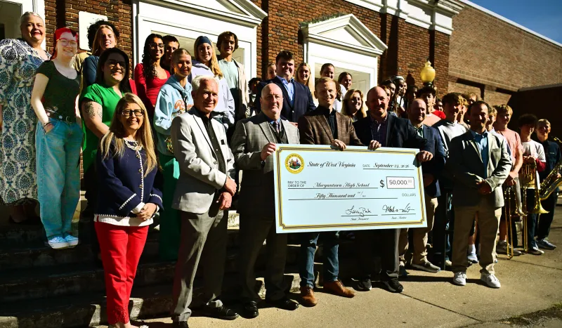 Lawmaker presents $50K check to MHS auditorium project