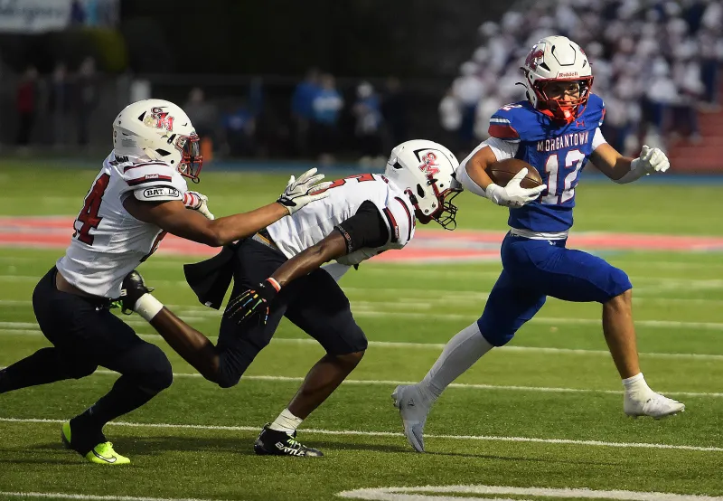 No. 2 Morgantown High uses strong ground game to earn 49-20 victory over No. 9 Spring Mills.