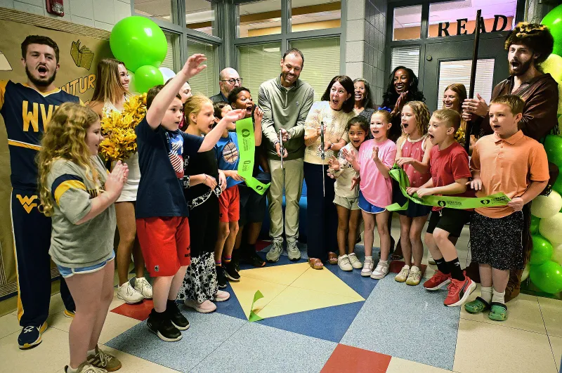 Mylan Park Elementary gets a Big 12 makeover in advance of Arizona game