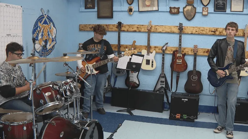 Logan High School band finds its rhythm with marching music and rock and roll