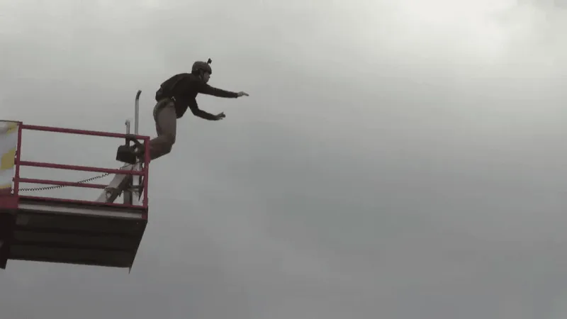 BASE jumpers brave 876-foot drop at New River Gorge Bridge Day