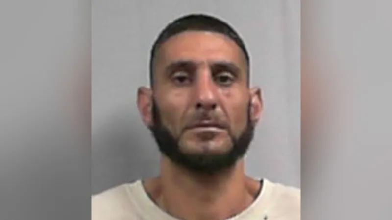 Wanted man arrested after alleged attempted car breaks-ins, pursuit in Barboursville