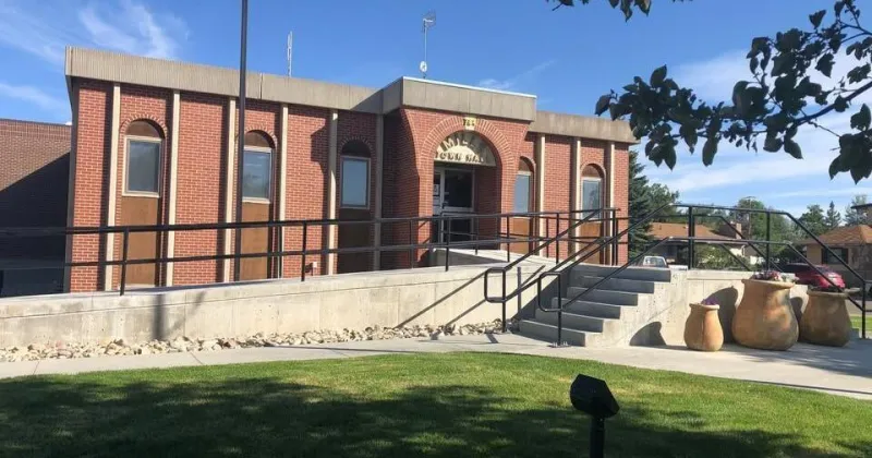 Mills' budget drops to $10.8M. Here's why