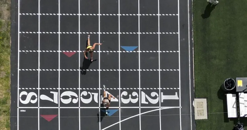 Girls' relay team leads Broncs at Nationals