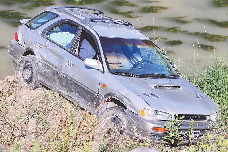 Woman thanks God, congregation after car goes into river