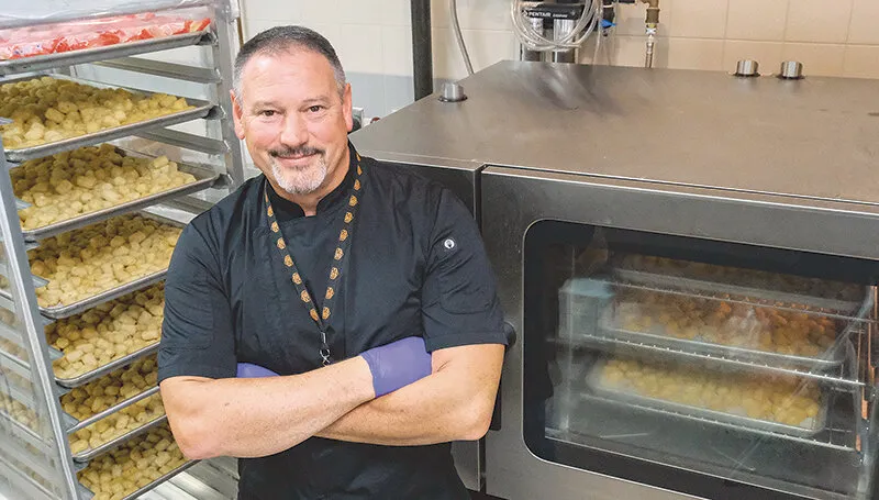 Lifetime of service: Former Powell PD lieutenant embraces role as PHS cook, custodian