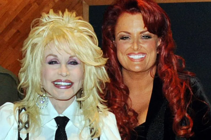 Wynonna Judd Admits She's Still 'In Denial' After Dolly Parton's Death [Exclusive]