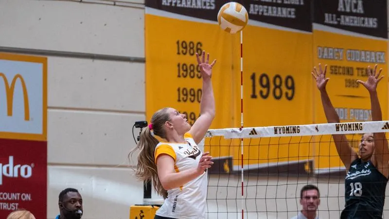 Cowgirls Close Orange & Black Classic with Four-Set Win