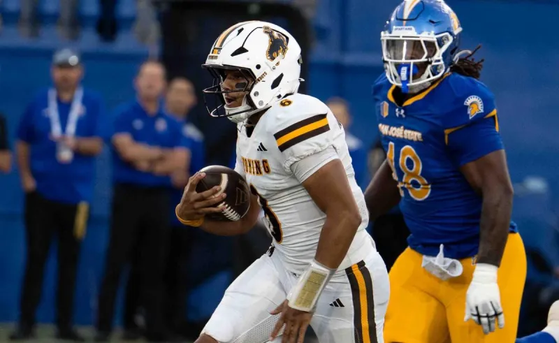 Hughes Puts Cowboys on His Bruised Back in 16-13 Overtime Win